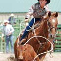 image of cowboy roping a calf