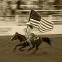 image of cowgirl with flag